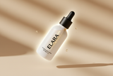 ELARA Retinol Night Oil floating bottle dramatic composition